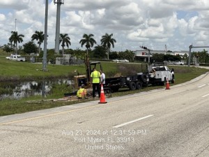 Crews are installing a Wrong-Way Detection sign base